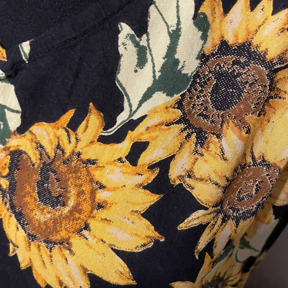 Sunflower dress, tiered, midi length.